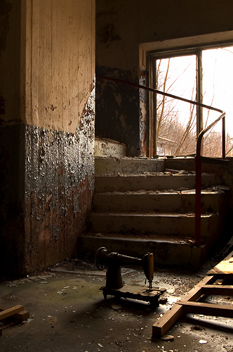 Sewing machine by stairway