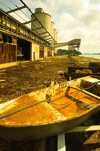 Rusty boat by the dock