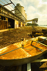 Rusty boat by the dock