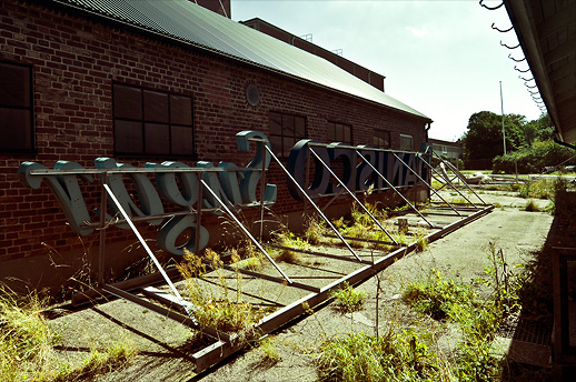 Danisco Sugar's sign stuffed in between the welfare buildings at Jordberga sockerbruk. Skåne, Sweden. August 2008.