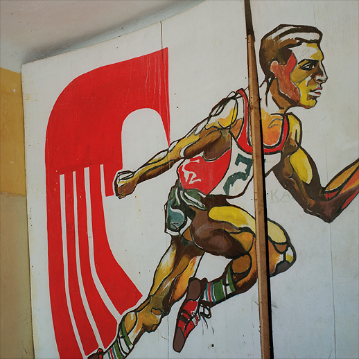 Sports deco in one of the barrack stairways at Soviet Military Base FZ. Former DDR, Germany. October 2013.