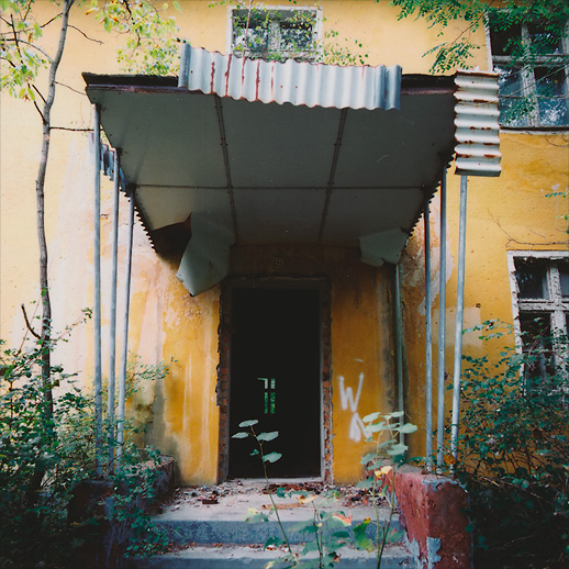 Barrack entrance with corrugated porch deco at Soviet Military Base FZ. Former DDR, Germany. October 2014.