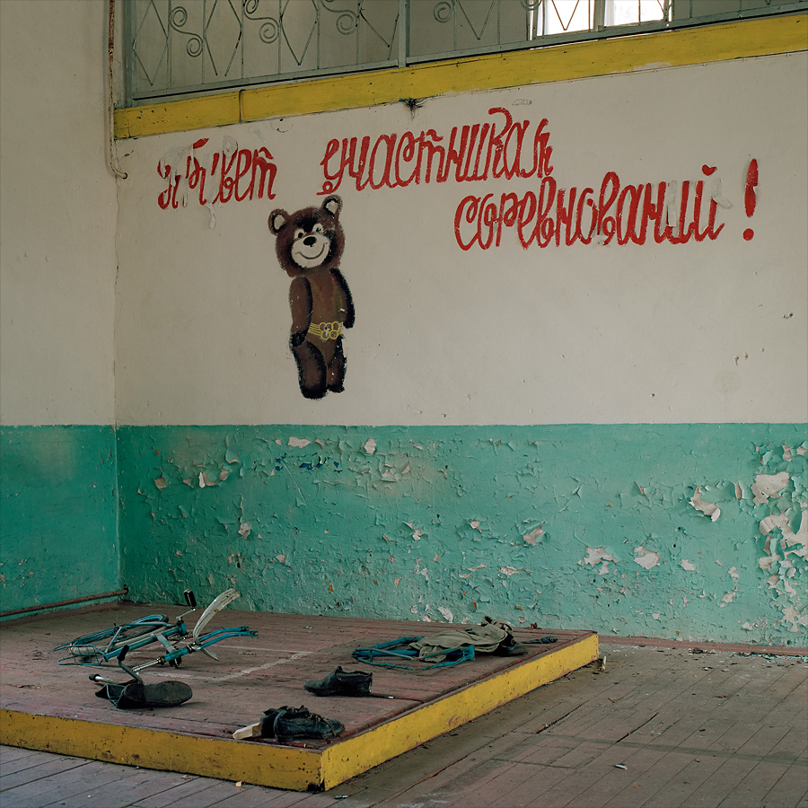 Gym wall decoration with the olympics mascot Mischa at Soviet Military Base V. Former DDR, Germany. October 2011.