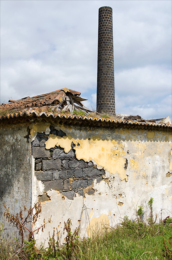 Backside exterior, with smoke stack at the abandoned whaling station. Azores, Portugal. June 2007.